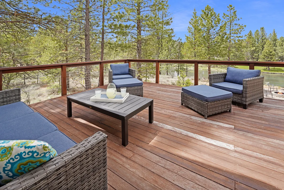 This exterior image features a cozy seating arrangement with a coffee table, set in natural surroundings. The inviting setup is perfect for relaxing, entertaining, or simply enjoying the outdoors with loved ones.